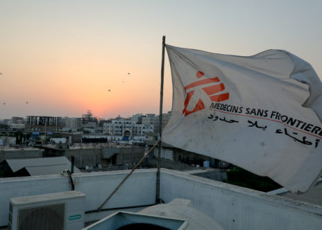 MSF flag over the top of the hospital